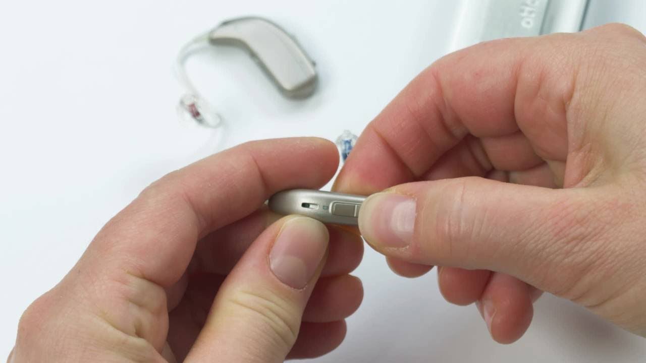 How to pair Oticon EduMic with hearing aids with rechargeable batteries ...
