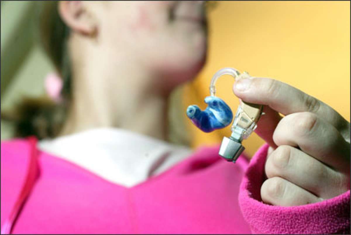 Should hearing aids be covered by health insurance?