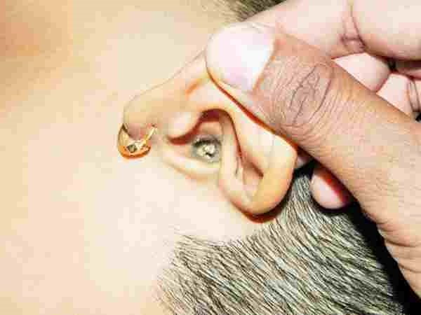 When Ear Wax Is Dark Ears Ringing Symptom