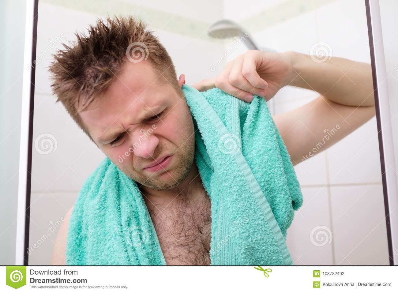 Young Man Cleaning His Ear While Taking A Shower And Standing Under ...
